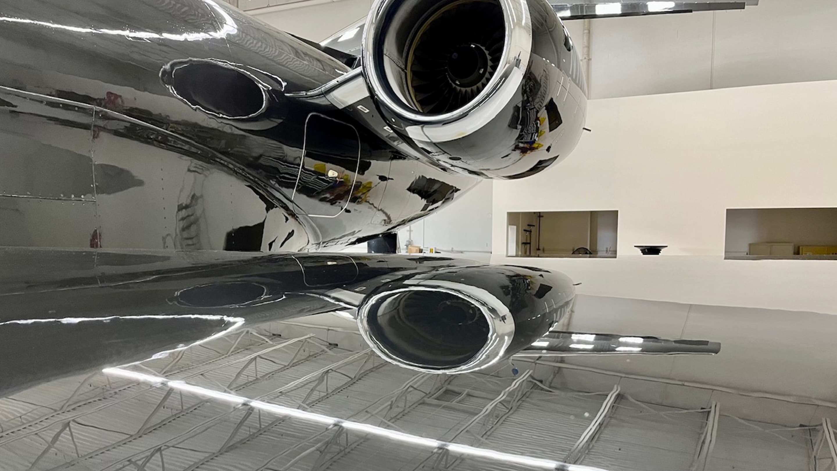 Highly reflective protected aircraft finish inside a hangar