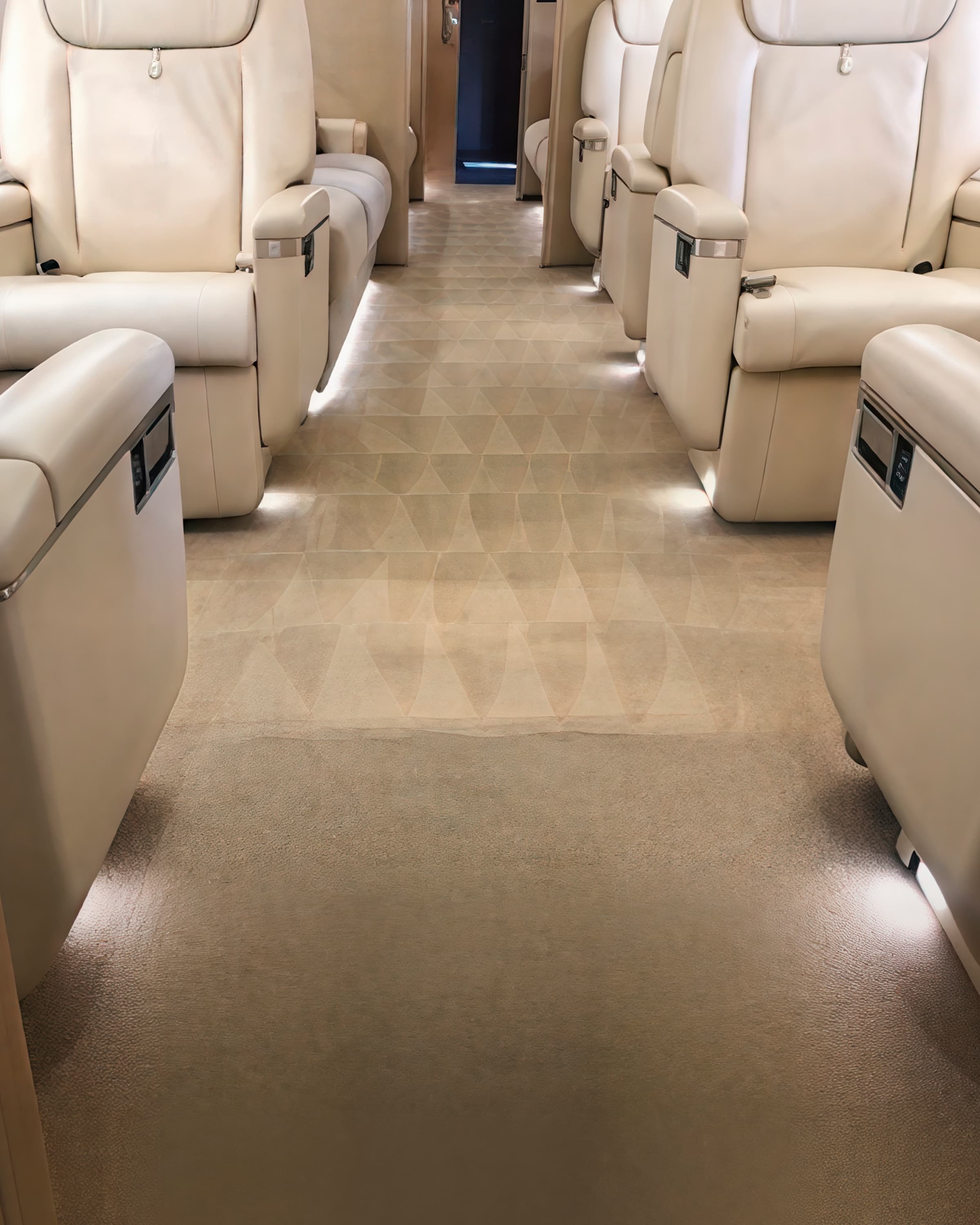 Private aircraft cabin with cream leather seating